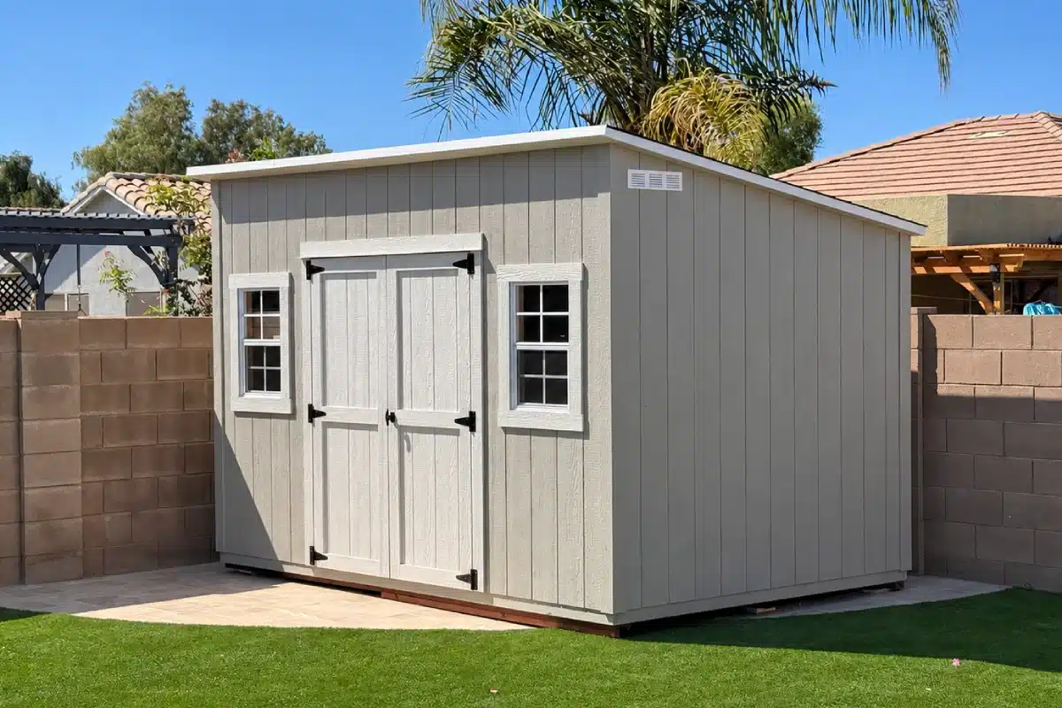 Gray 12×8 Standard lean-to shed with white double doors and two windows, built on-site in San Tan Valley, AZ